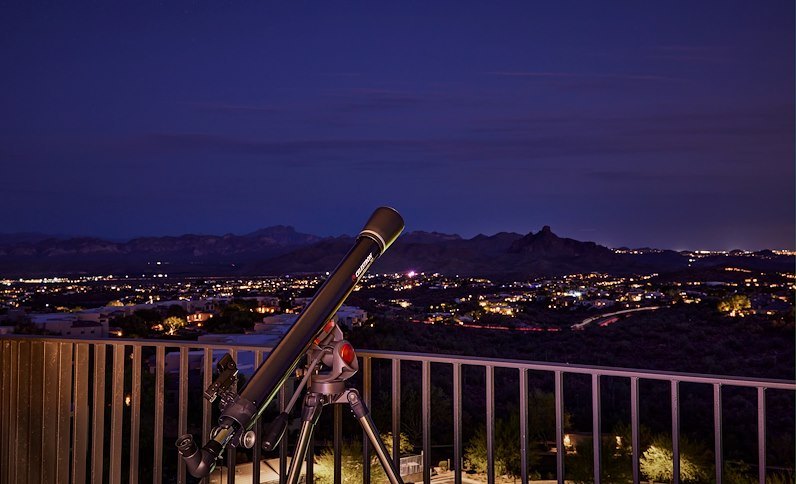 A stargazing telescope on the terrace at Adero after dark
